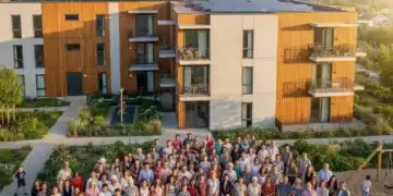 Modern affordable housing complex with diverse residents and green spaces